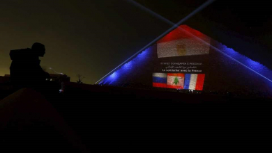 the Russian, Lebanese and French flags are projected on one of the Giza pyramids, in tribute to victims from the respective countries, on the outskirts of Cairo, Egypt