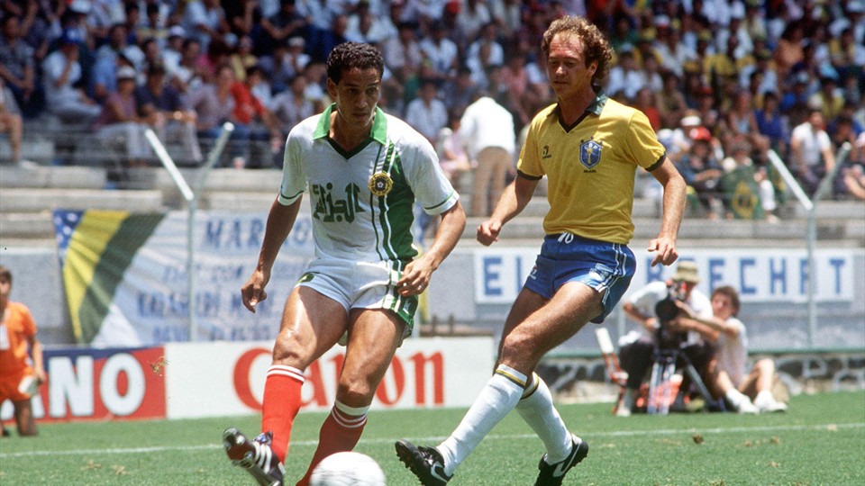 Algeria's Fawzi Mansouri is pursued by Brazil’s Falcao at Mexico 1986- Image courtesy: FIFA Official Website